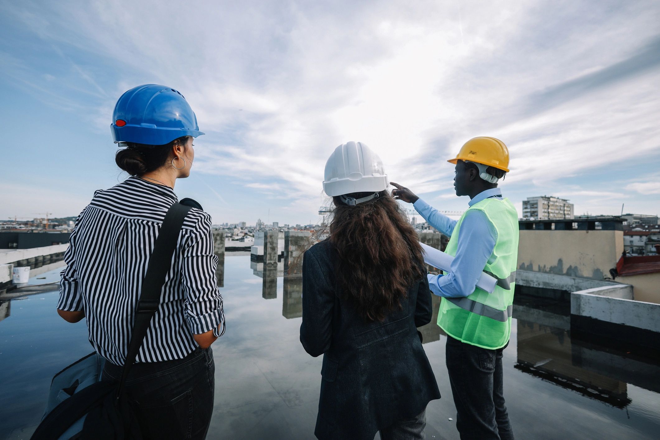 Project stakeholders meeting at a construction site